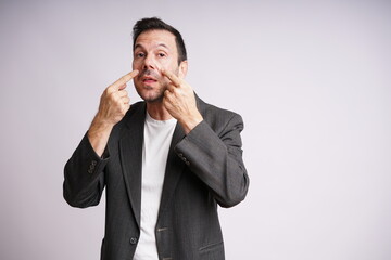 Male Model Showing Different Emotions on White Studio Background