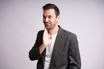 Male Model Showing Different Emotions on White Studio Background
