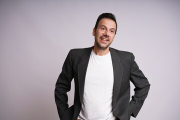 Fototapeta premium Male Model Showing Different Emotions on White Studio Background