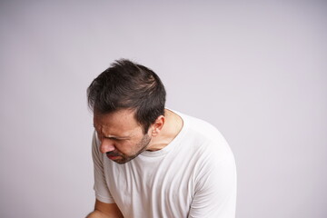 Male Model Showing Different Emotions on White Studio Background
