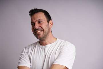Fototapeta premium Male Model Showing Different Emotions on White Studio Background