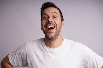 Fototapeta premium Male Model Showing Different Emotions on White Studio Background