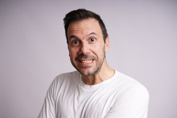 Male Model Showing Different Emotions on White Studio Background