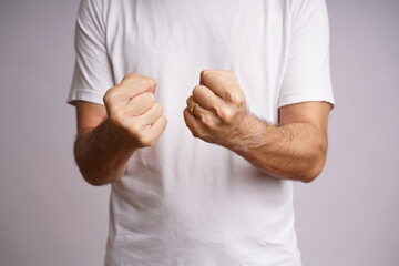 Expressive Male Hands on White Background in Studio Lighting