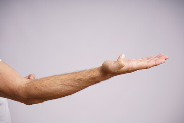 Expressive Male Hands on White Background in Studio Lighting