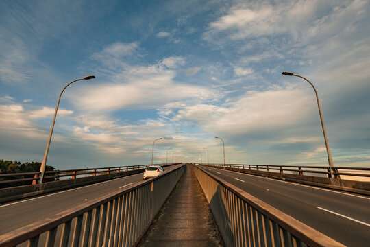 Walkway across top of Stockton Bridge between dual traffic lanes