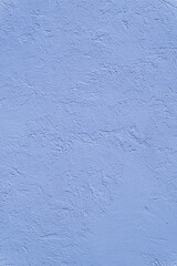 Beautiful uneven blue texture. Neutral decorative background.