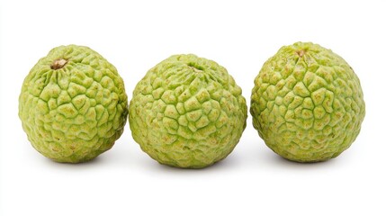Obraz premium Three custard apples on a white background.
