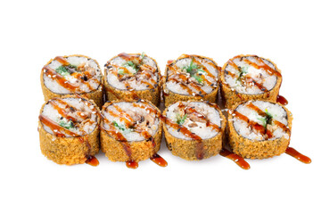 Eight deep-fried sushi rolls filled with fresh greens and vegetables, topped with sesame seeds and sweet teriyaki sauce. Japanese-style fusion appetizer isolated on white background