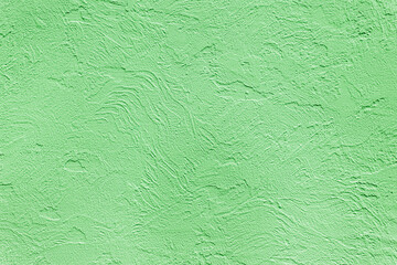Beautiful uneven green texture. Neutral decorative background.