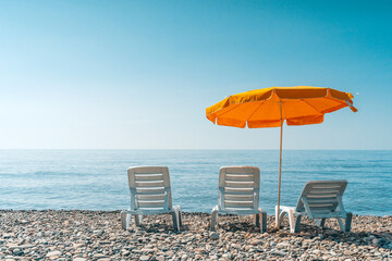 Sunny Beach with Loungers and Umbrella