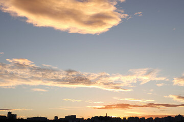 The silhouette of the city against the sunset.