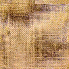 Natural light brown burlap fabric texture, natural jute texture, jute Fabric background, sack cloth, sackcloth woven texture background seamless pattern. Jute burlap, linen in light beige cream color 