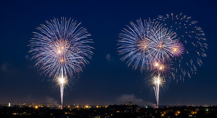 Fototapeta premium Night Sky Celebration: Bursting Fireworks Display Over City