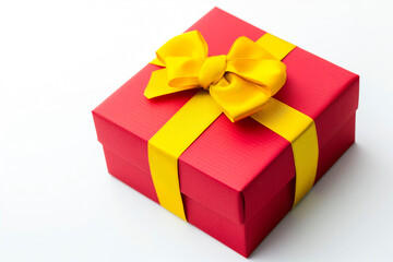 Red Gift Box with Yellow Bow and Ribbons on a white background