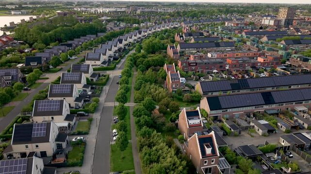 Row of houses with solar panels, modern sustainable neighbourhood in dutch city of Heerhugowaard