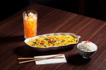yellow thai curry with rice  drink 