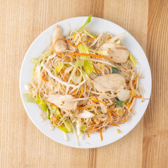 lo mein noodles stri fried noodles with chicken and vegetables top view flatlay