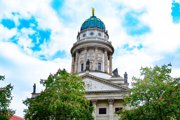 Majestic French Cathedral's dome in Berlin under bright sky. Architecture and history, Gendarmenmarkt square Historical landmark, Culture and travel, historical tourist attractions