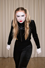 Close-up portrait of a mime girl expressing displeasure