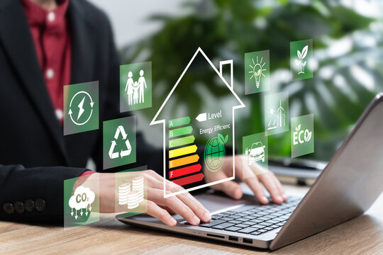 Home energy efficiency level, Saving energy consumption, Green technology concept, Businesswomen reducing energy and heat to preserve environment, Low carbon emissions, Renewable energy Cost reduction - Powered by Adobe