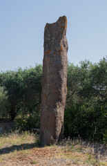 Ancient standing stone Menhir of Luxia Arrabiosa in southern Sardinia