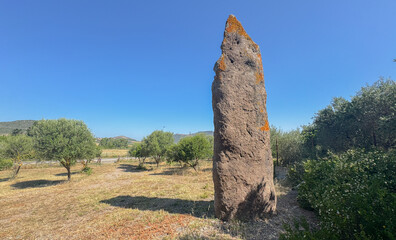 Ancient standing stone Menhir of Luxia Arrabiosa in southern Sardinia