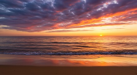 Fototapeta premium Dramatic Coastal Sunset Scene with Colorful Clouds and Reflections