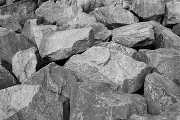 Large rocks background in black and white monochrome