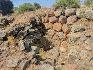 Ancient stone Nuraghe ruins surrounded by nature in southern Sardinia