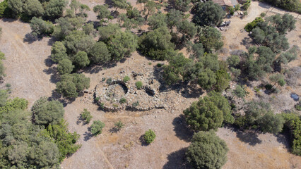 Ancient stone Nuraghe ruins surrounded by nature in southern Sardinia