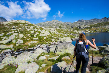Young hiker woman in Vall de Boi, Aiguestortes and Sant Maurici National Park, Spain