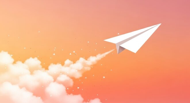 Fototapeta White paper airplane soaring through a vibrant orange and pink gradient sky with fluffy clouds