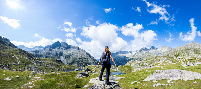 Young hiker woman in Vall de Boi, Aiguestortes and Sant Maurici National Park, Spain
