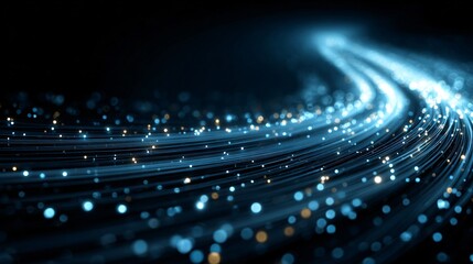 Abstract rende of light trails swirling dynamically through space on a dark background suggesting movement and technological advancement with bokeh effects.