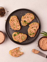 pate on fresh baguette with greens