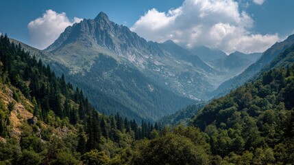 Majestic Mountain Landscape with Lush Forest and Cloudy Sky