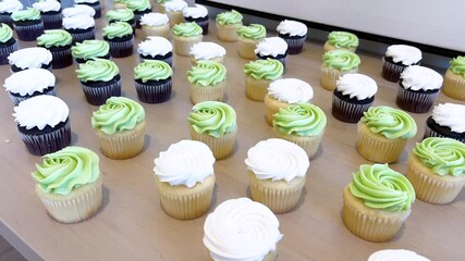 Assorted Cupcakes with Swirled Frosting on Display