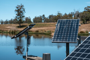 irrigation Solar Panels Powering a Farm Dam in Rural Australia. Showcasing Sustainable Energy Solutions for Agriculture, Clean Technology, and Eco Friendly Farming Practices