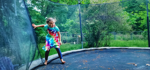 Girl having fun on a trampoline