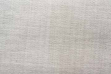 Texture of light gray fabric. Textile. Canvas. silk white material