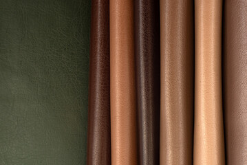 Palette of multi-colored pieces of genuine leather. Accessories for sewing. Leather material