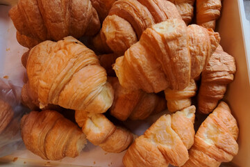 Delicious fresh croissants, perfect for a sweet breakfast.