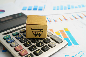 Online shopping, Shopping cart box on calculator, import export, finance commerce.