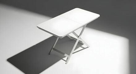 Fototapeta premium Minimalist White Folding Table On Light Gray Background Showing Shadows