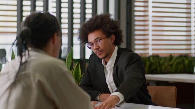 African American business leader businessman insurance agent bank reading resume intern sad client man dissatisfied refuse no typing laptop failed job interview two businessmen office bad work report