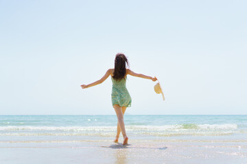 Beautiful caucasian white woman relax on the beach with surfboard. Woman in bikini's portrait with surfboard.