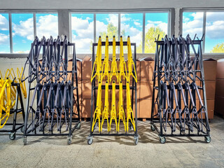 Production line of painted bicycle frames arranged on a rack in a factory
