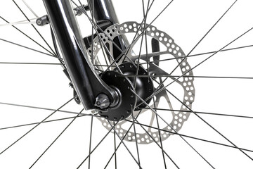 Part of bike brake disc in close up isolated on white. Details of bike front wheel axle disc brake damper.