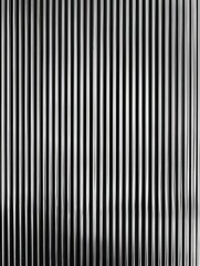 Obraz premium Vertical striped texture of transparent glass. The glass structure with lines creating a visually interesting graphic pattern.